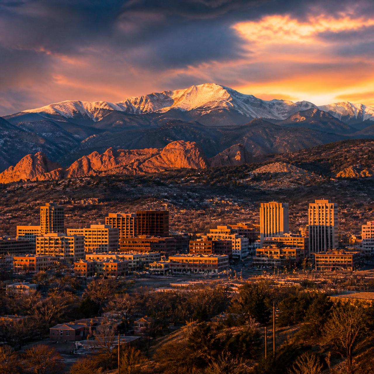 Colorado Springs skyline with Pikes Peak at golden hour